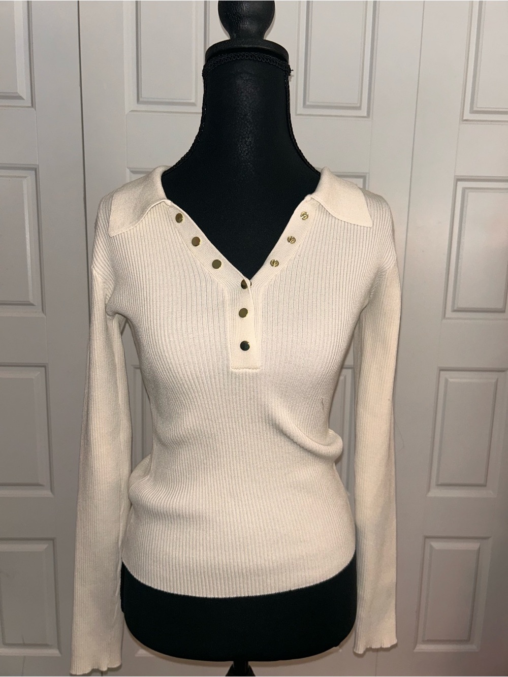 Size M cream colored sweater